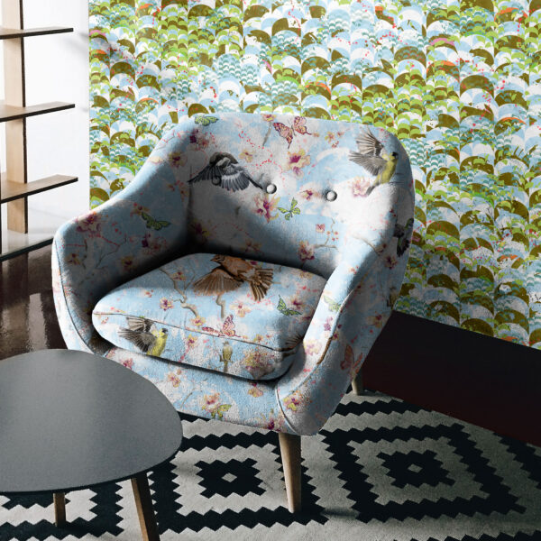 Pattern Avia, colour Joy, on chair. Pluvia, colour Clear, on wall.