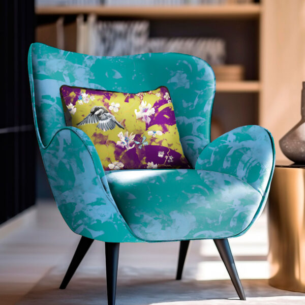 Pattern Silvis, colour Jewel, on chair. Avia, colour Rapture, on pillow.