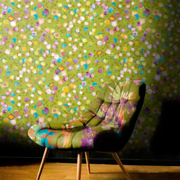 Pattern Bloom, colour Shimmer, on wall. Bouquet, colour Flash, on chair.