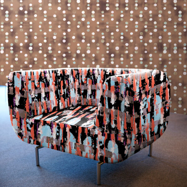 Pattern Poster, colour Jazz, on chair. Signal, colour Bark, on wall.