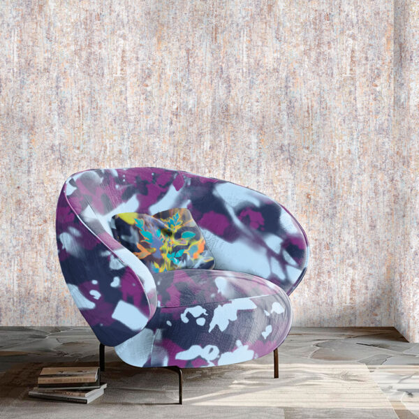 Pattern Dapple, colour Shade, on chair. Bouquet, colour Shadow, on pillow. Sheen, colour Meditate, on wall.