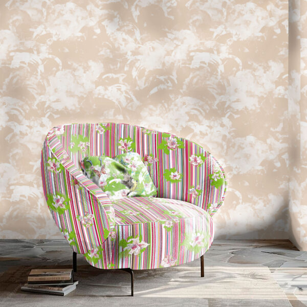 Pattern Spalliera, colour Blossom, on chair. Silvis, colour Meme, on wall. Avia, colour Spring, on pillow.