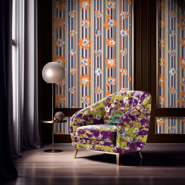 Pattern Avia, colour Rapture, on chair. Spalliera, colour Bohemian, on wall. Pluvia, colour Bacchus, on pillow.