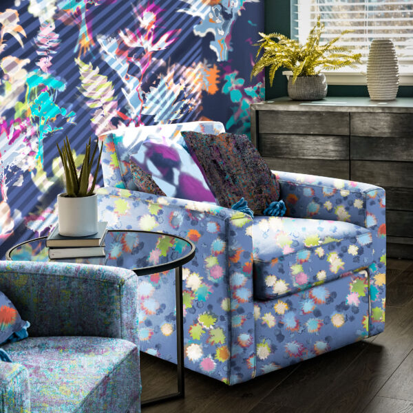 Pattern Bouquet, colour Shadow on wall. Bloom, colour Ombra on centre chair. Dapple, colour Shade on pillow on centre chair. Sheen, colour Galaxy on pillow on centre chair. Sheen, colour cool on left chair.