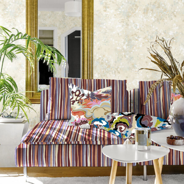 Textile and wallcovering designs from the Oh Canada collection. 49 on sofa, Taylor Head and Lichen on pillows and Splash on wall.