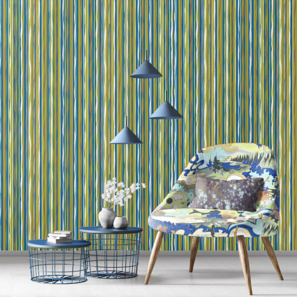 Design for textiles and wallcovering from the Oh Canada collection. 49th on wall, Taylor Head on chair, and Splash on pillow.