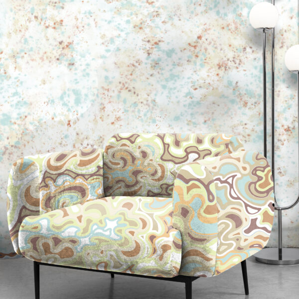 Textile and wallcovering designs from the Oh Canada collection. Current on chair and Splash on wall.