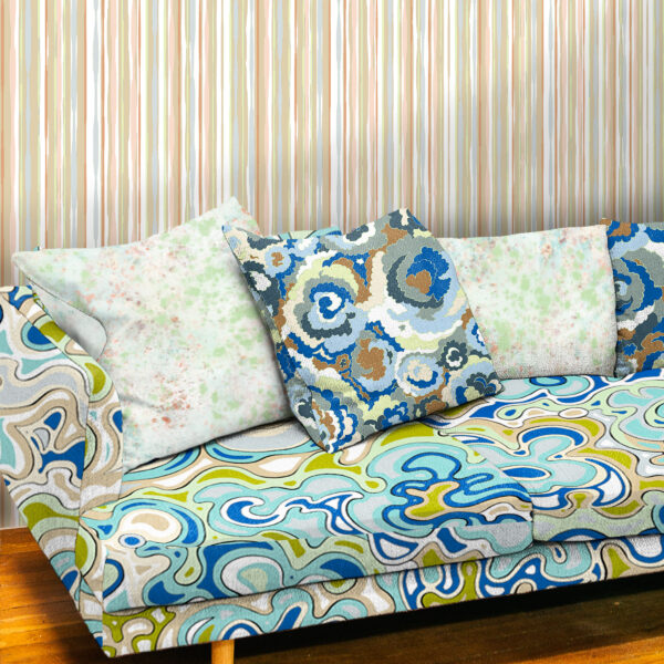 Textile and wallcovering designs from the Oh Canada collection. Current on sofa, Lichen and Splash on pillows. 49 on wall.