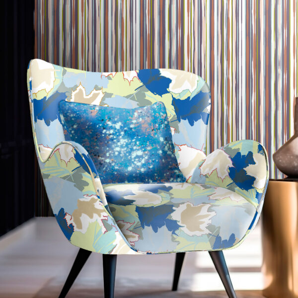Textile and wallcovering designs from the Oh Canada collection. Maple on chair, Splash on pillow, 49 on wall.