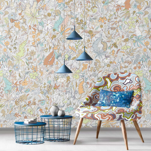 Designs for textiles and wallcovering from the Oh Canada collection. Wildthing on wall, Current on chair, and Splash on pillow.