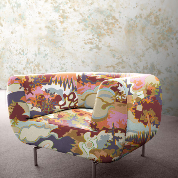 Designs from the Oh Canada collection of fabrics and wallcoverings. Taylor Head on chair and Splash on wall.