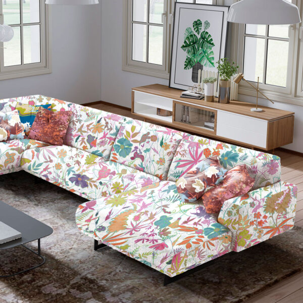 Patterns from the Oh Canada textile and wallcovering collection. Wildthing on sofa, Maple, Splash and Taylor Head on cushions.