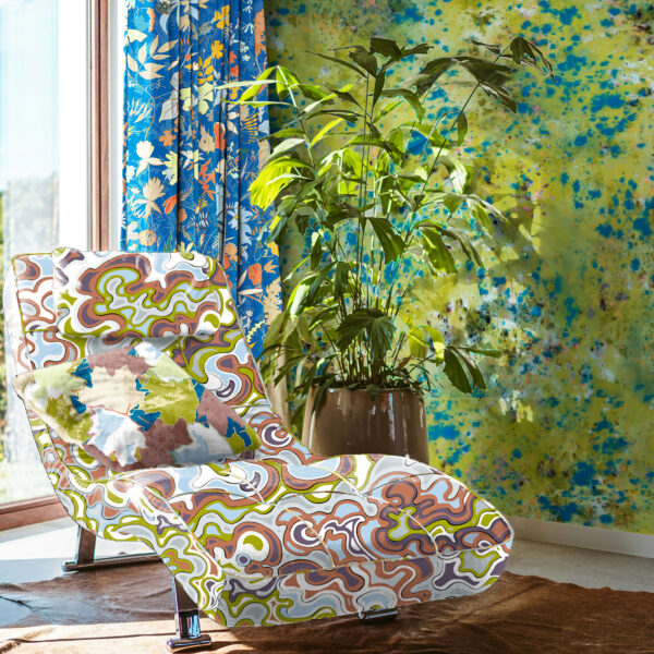 Designs for textiles and wallcoverings from the Oh Canada collection. Current on chair, Maple on pillow, Splash on wall and Wildthing on drapes.