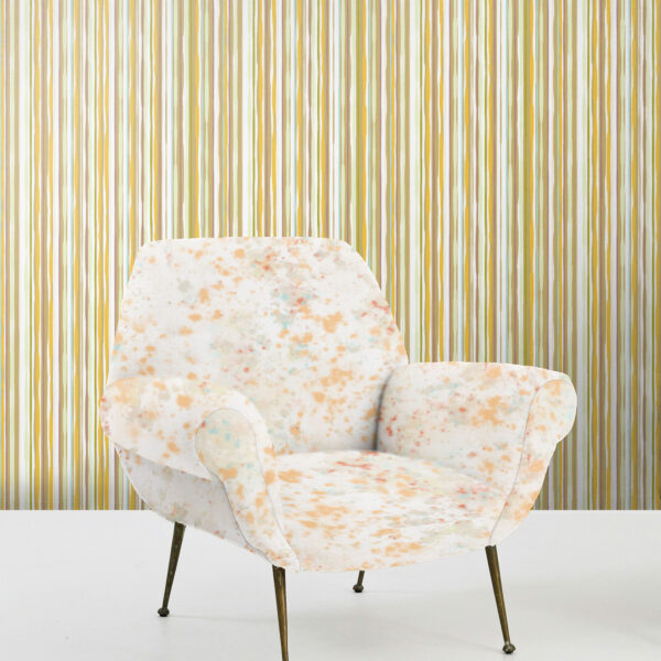Designs from the Oh Canada textile and wallcovering collection. Splash on chair and 49 on wall.