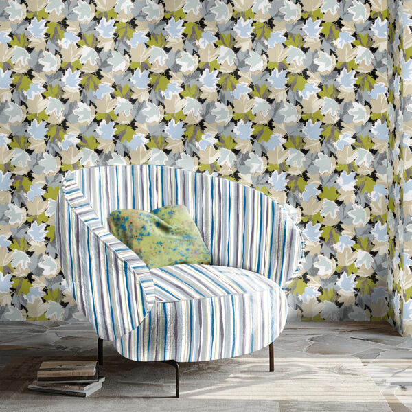 Textile and wallcovering designs from the Oh Canada collection. 49th on chair, Maple on wall, and Splash on pillow.